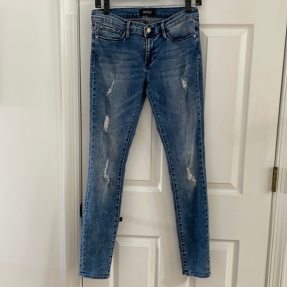 Buffalo distressed jeans.